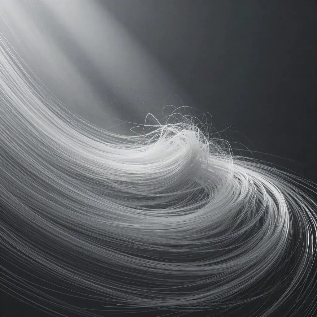 Abstract silver filaments converge into a soft white bloom in graphite haze.